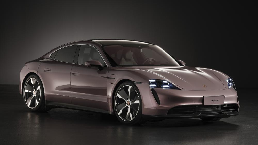 Porsche Taycan Electric SUV in Sleek Studio Glow wallpaper