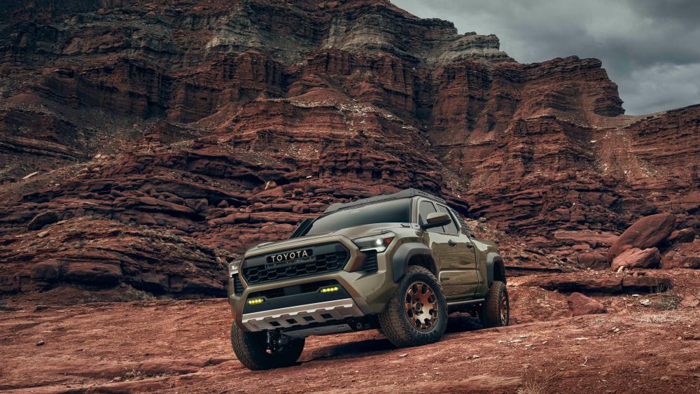 Rugged Toyota Tacoma Conquers Red Rock Terrain wallpaper