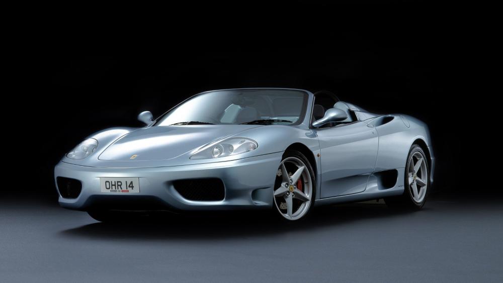 Silver Ferrari 360 Spider on Black Stage wallpaper