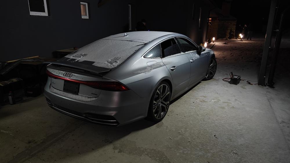 Sleek Audi A7 in Winter Setting wallpaper