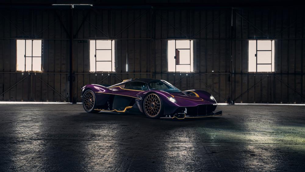 Aston Martin Valkyrie in Shadowed Hangar wallpaper
