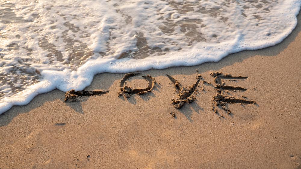 Love Written in the Sand by the Sea wallpaper