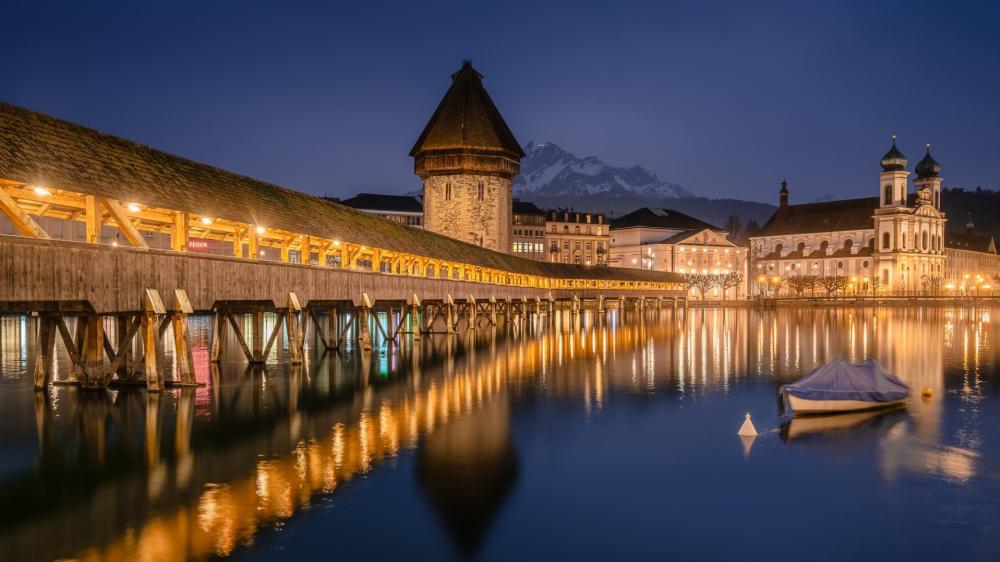 Kapellbrucke Twilight Reflections in Lucerne wallpaper