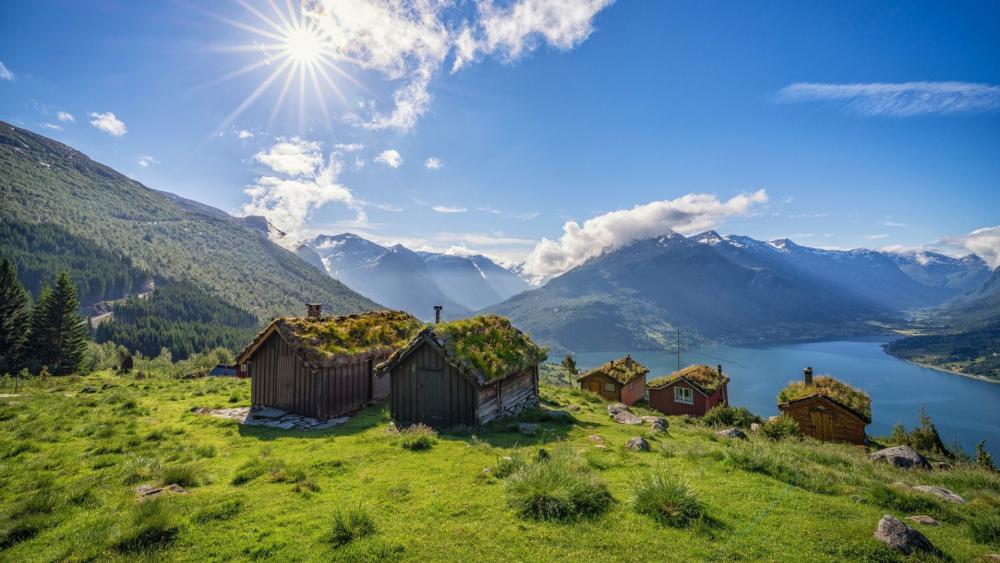 Sunlit Cabins Above Loen Fjord wallpaper