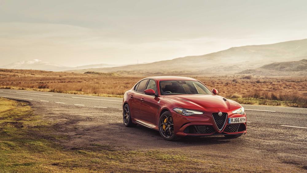 Red Alfa Romeo Giulia on Open Road wallpaper