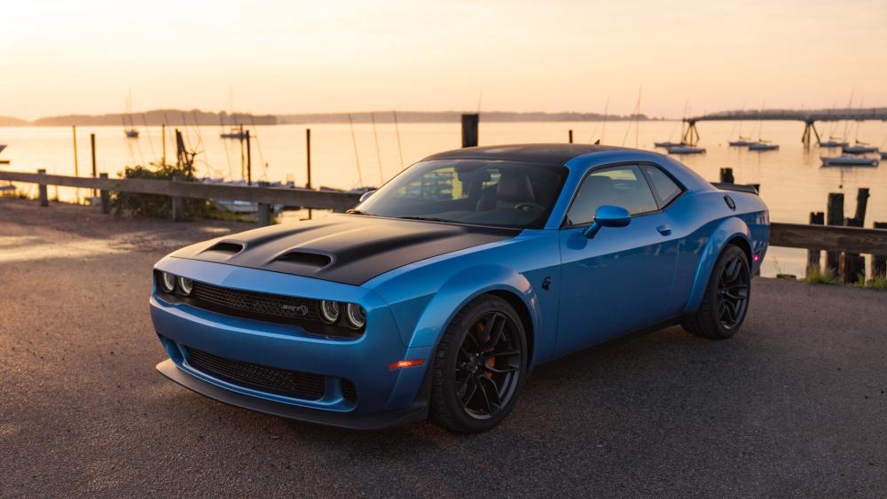 Blue Muscle Car at Sunset by the Harbor wallpaper