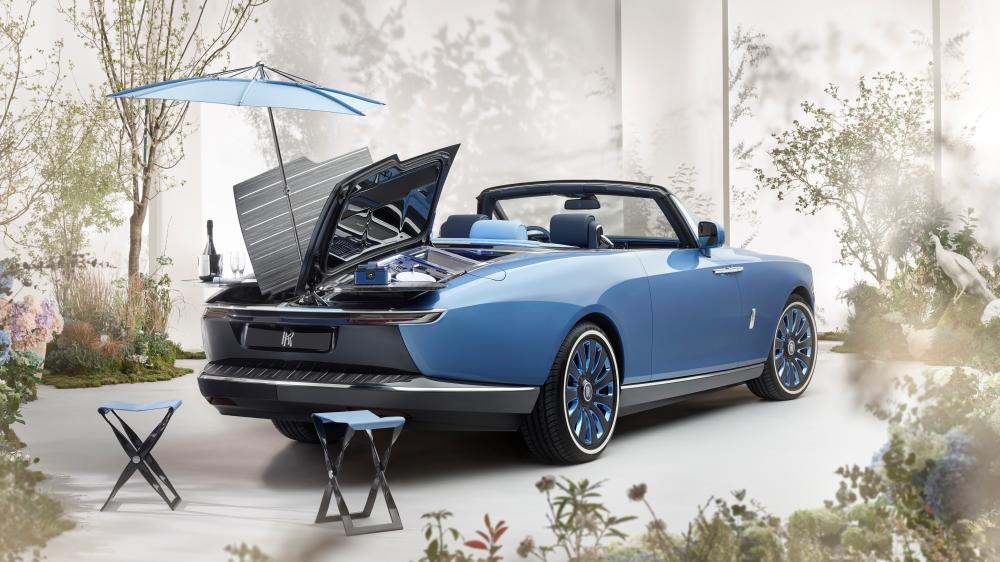 Elegant Blue Rolls Royce Boat Tail Showcase wallpaper