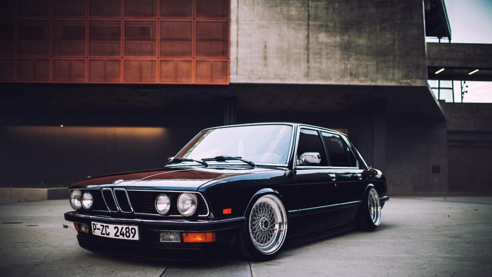 Vintage Black BMW M3 in Urban Setting wallpaper
