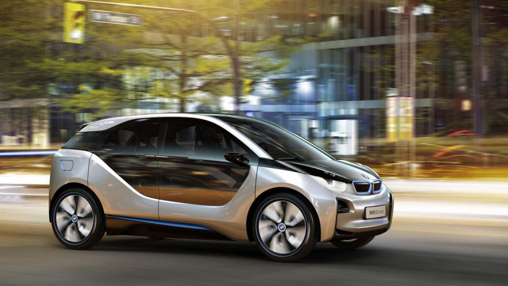 BMW i3 Gliding Through City Lights wallpaper