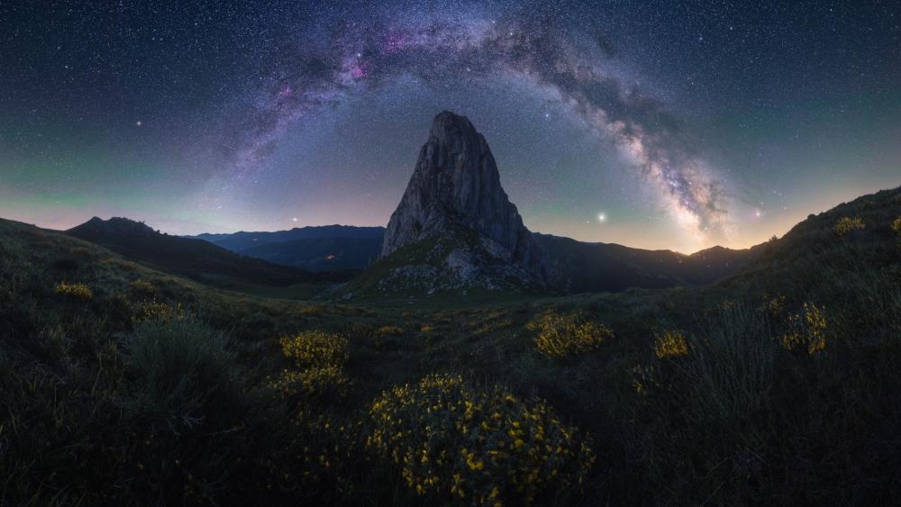 Celestial Arch Over Silent Peak wallpaper