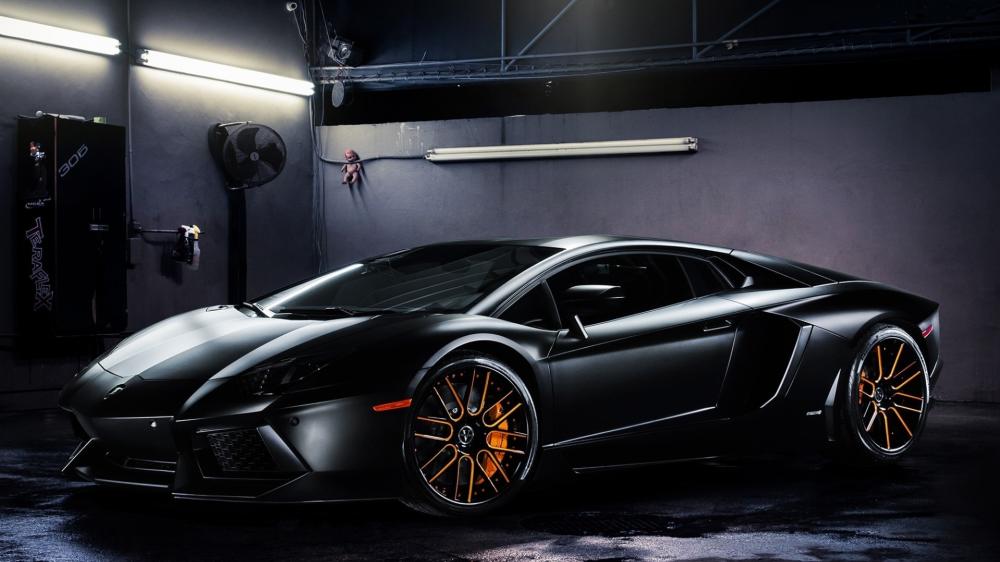 Sleek Black Lamborghini Aventador wallpaper