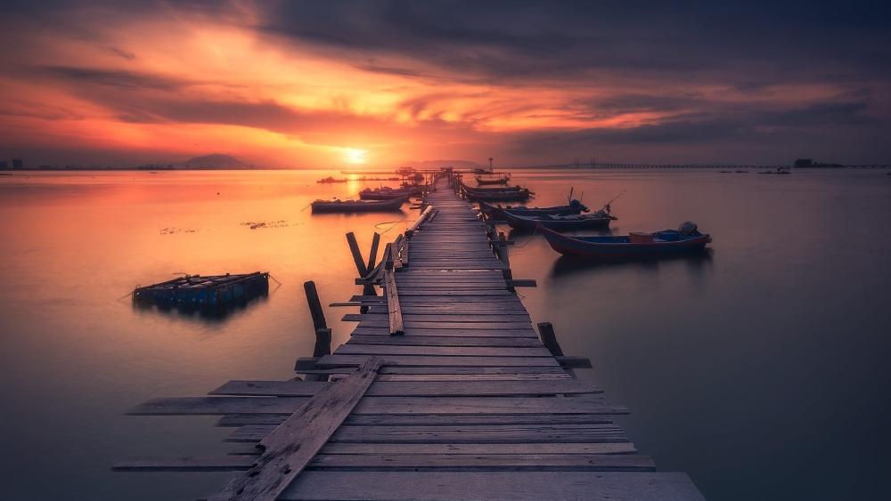 Golden Sunset Over the Quiet Pier wallpaper