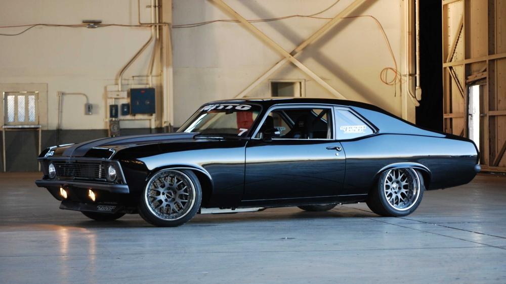 Sleek Chevrolet Nova In Industrial Garage wallpaper