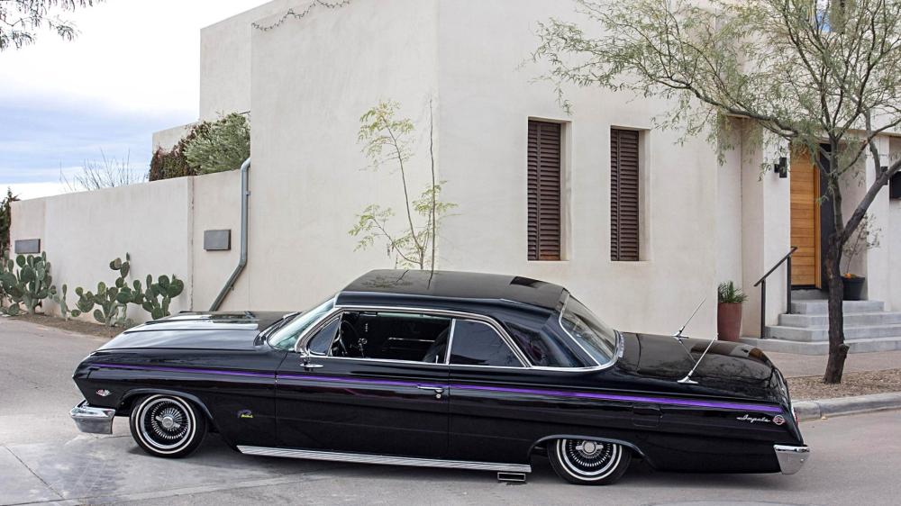 Classic Black Chevrolet Impala Lowrider wallpaper