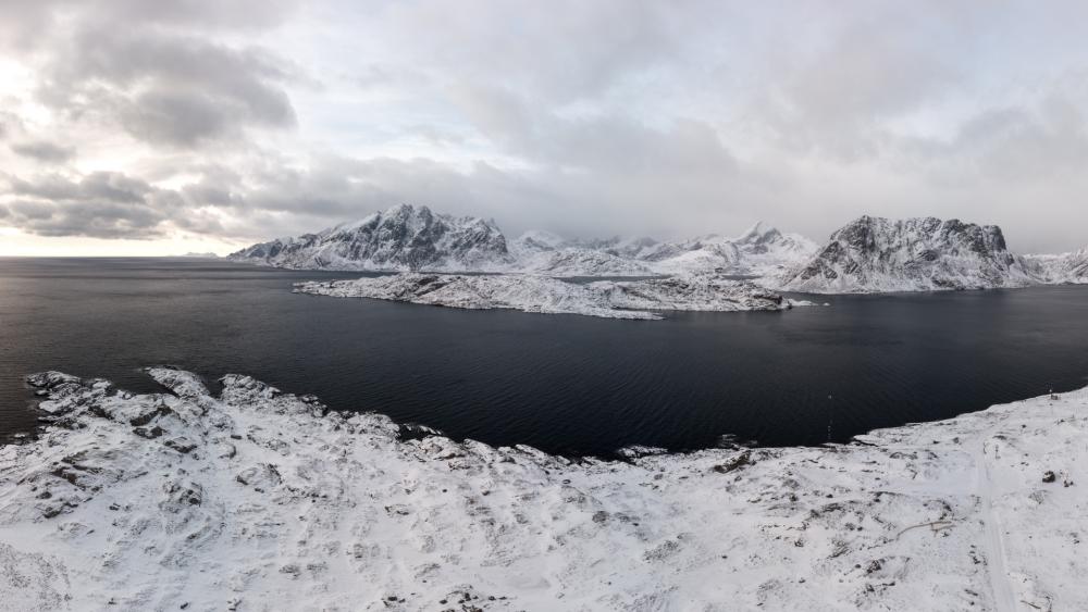 Panoramic View of Snowy Bay Lofoten Norway wallpaper