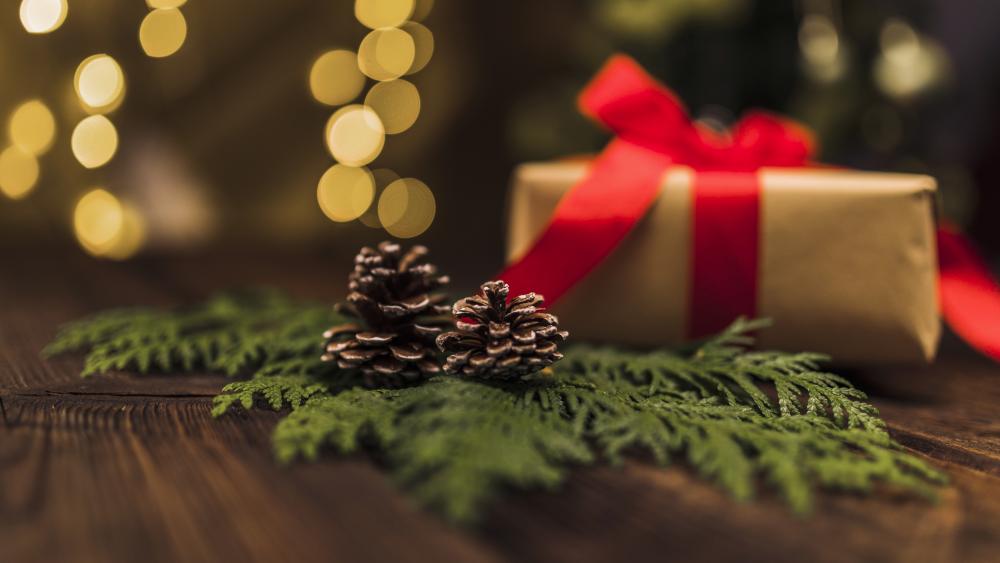 Festive Gift and Pinecones wallpaper