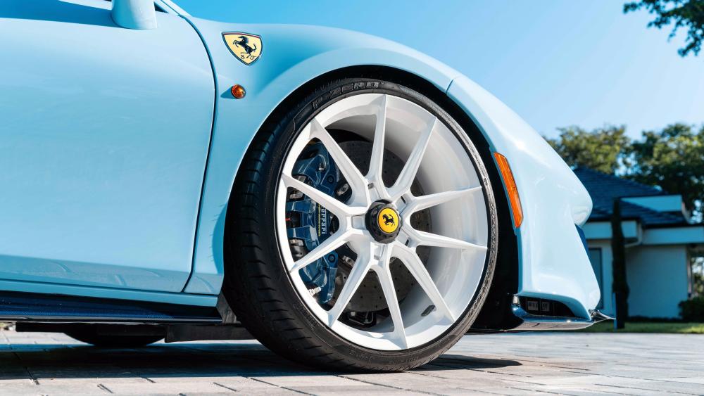 Blue Ferrari Wheel Elegance wallpaper