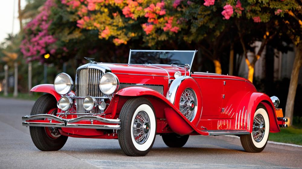 Classic Red Duesenberg Roadster wallpaper