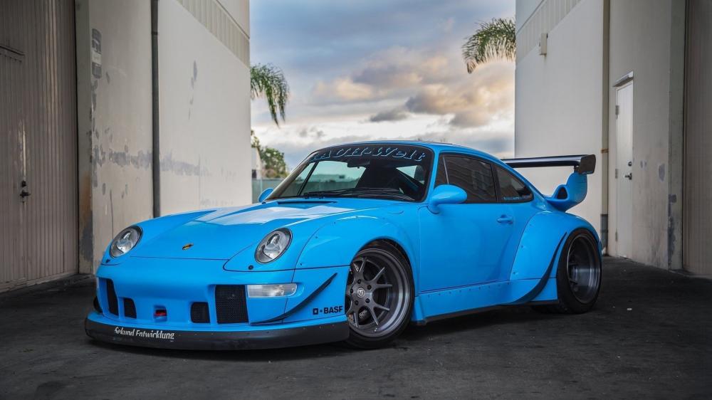 Blue Porsche 911 Carrera Widebody wallpaper