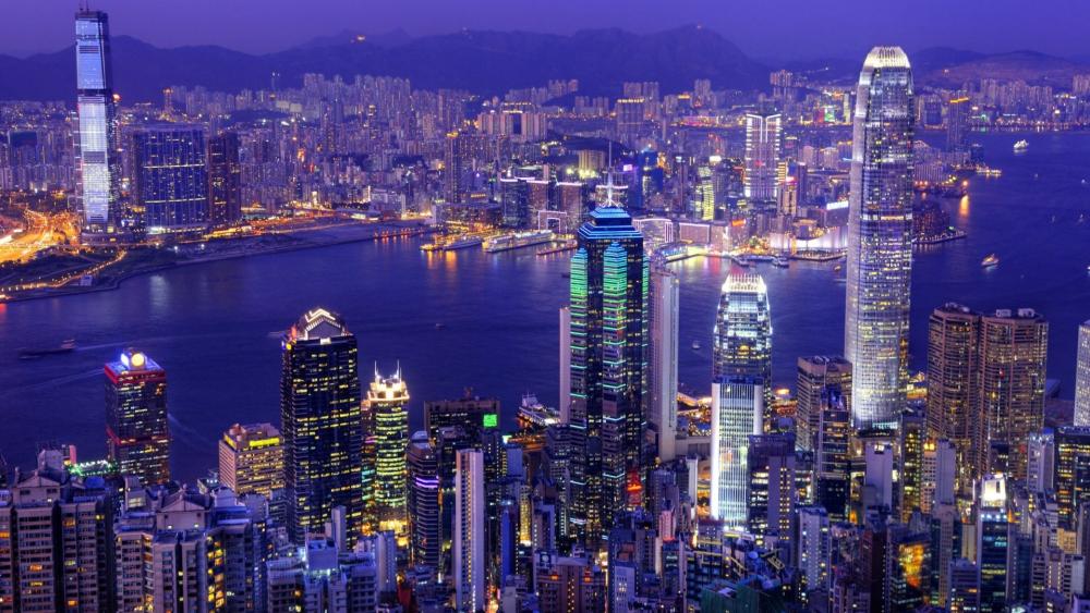 Victoria Peak Skyline Over Hong Kong Harbor wallpaper