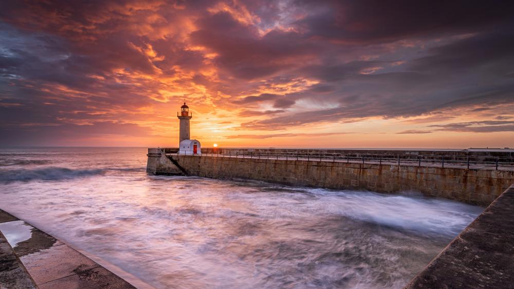 Radiant Sunset at Felgueiras Lighthouse in Porto wallpaper
