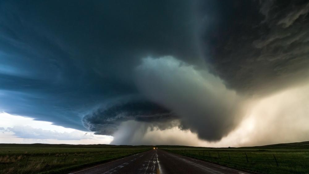 Storm Chasing Under a Vast Supercell Sky wallpaper