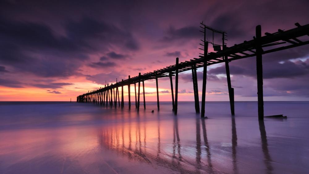 Purple Sunset Over Tranquil Phangnga Pier wallpaper