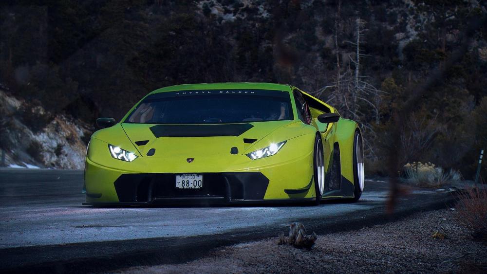 Low Slung Lamborghini Huracan on Dark Mountain Road wallpaper