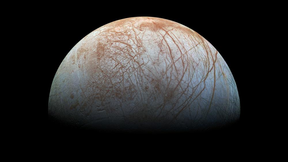 Europa’s Icy Surface in Deep Space wallpaper