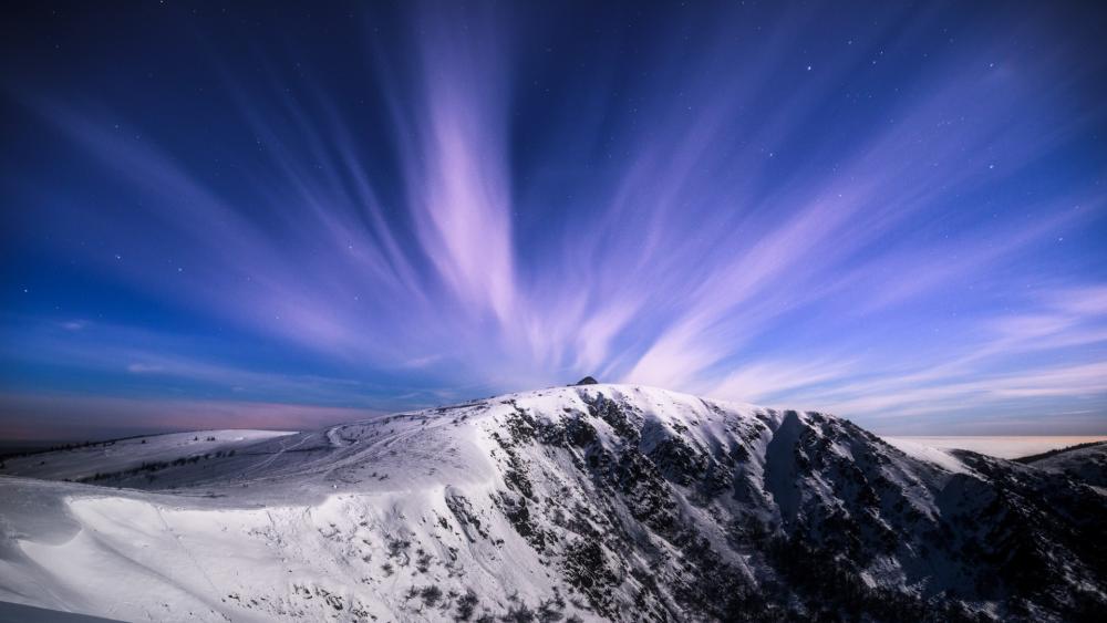 Twilight Snowy Peak Under Starlit Sky wallpaper