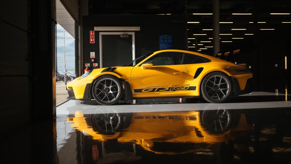 Yellow Porsche 911 GT3 RS in Motion wallpaper