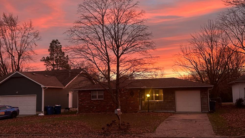 Serene Sunset Over a Quiet Neighborhood wallpaper