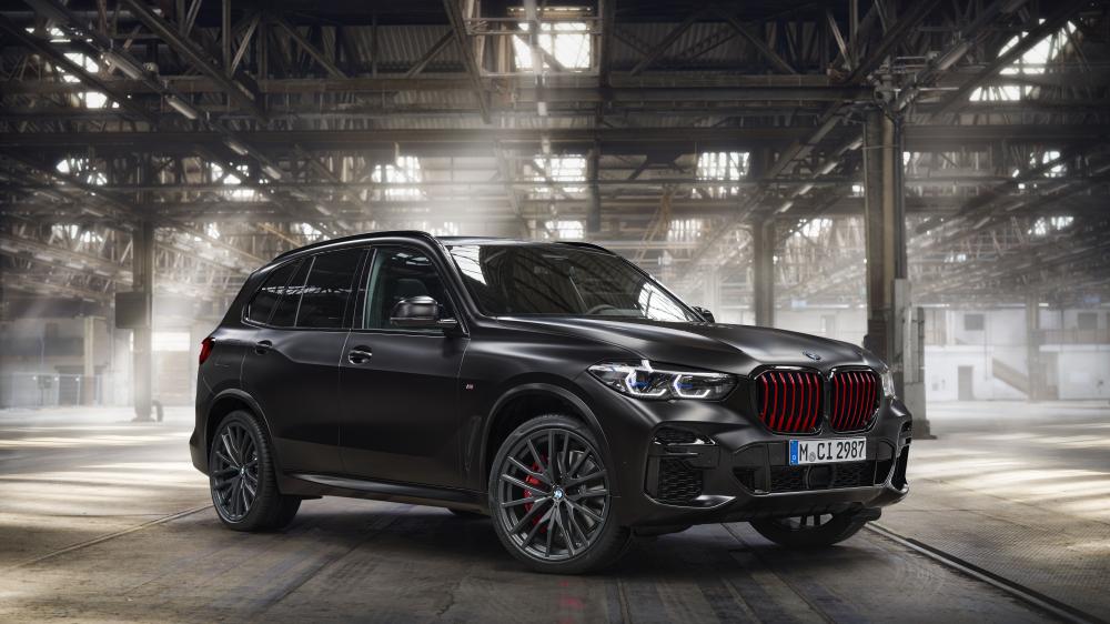 BMW X5 M50i Bold Industrial Performance wallpaper