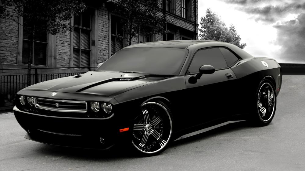 Sleek Black Dodge Challenger wallpaper