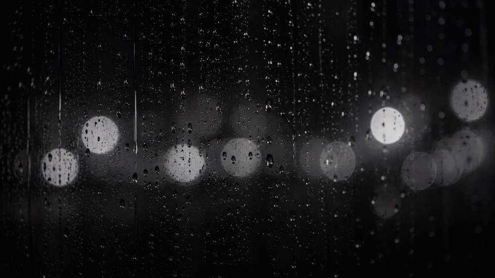 Rainy Night Bokeh Through Glass wallpaper