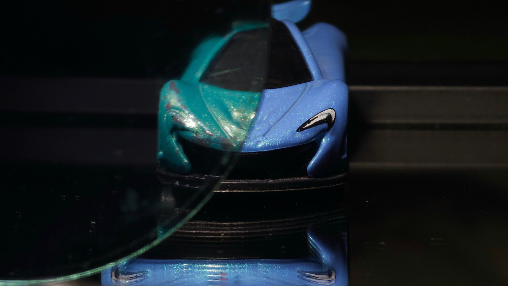Glowing Toy Car Reflection wallpaper
