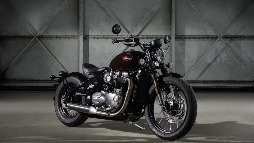 Classic Triumph Bonneville in Dark Garage wallpaper