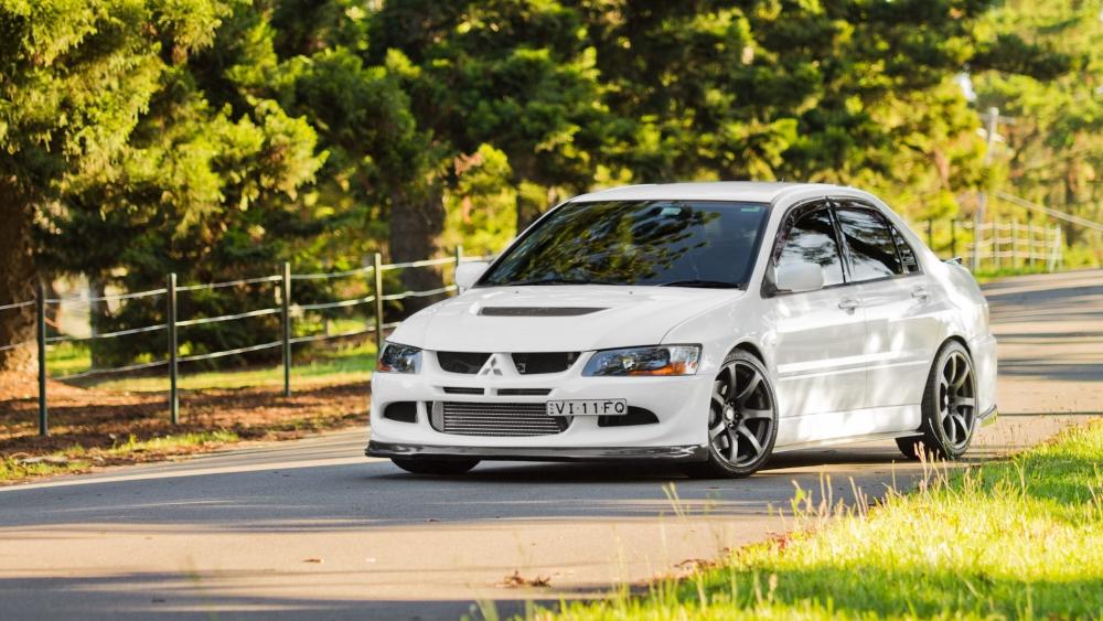 White Mitsubishi Lancer Evo on Scenic Road wallpaper