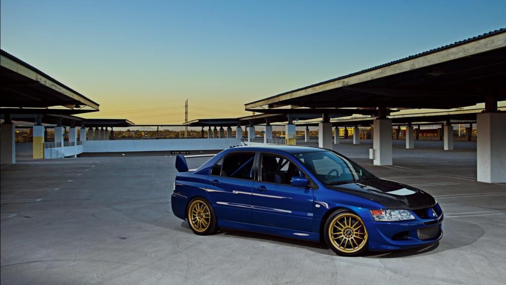Blue Mitsubishi Evo at Sunset wallpaper