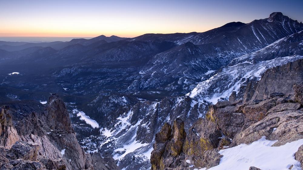 Snowy Peaks Over Rocky Mountain Valley wallpaper