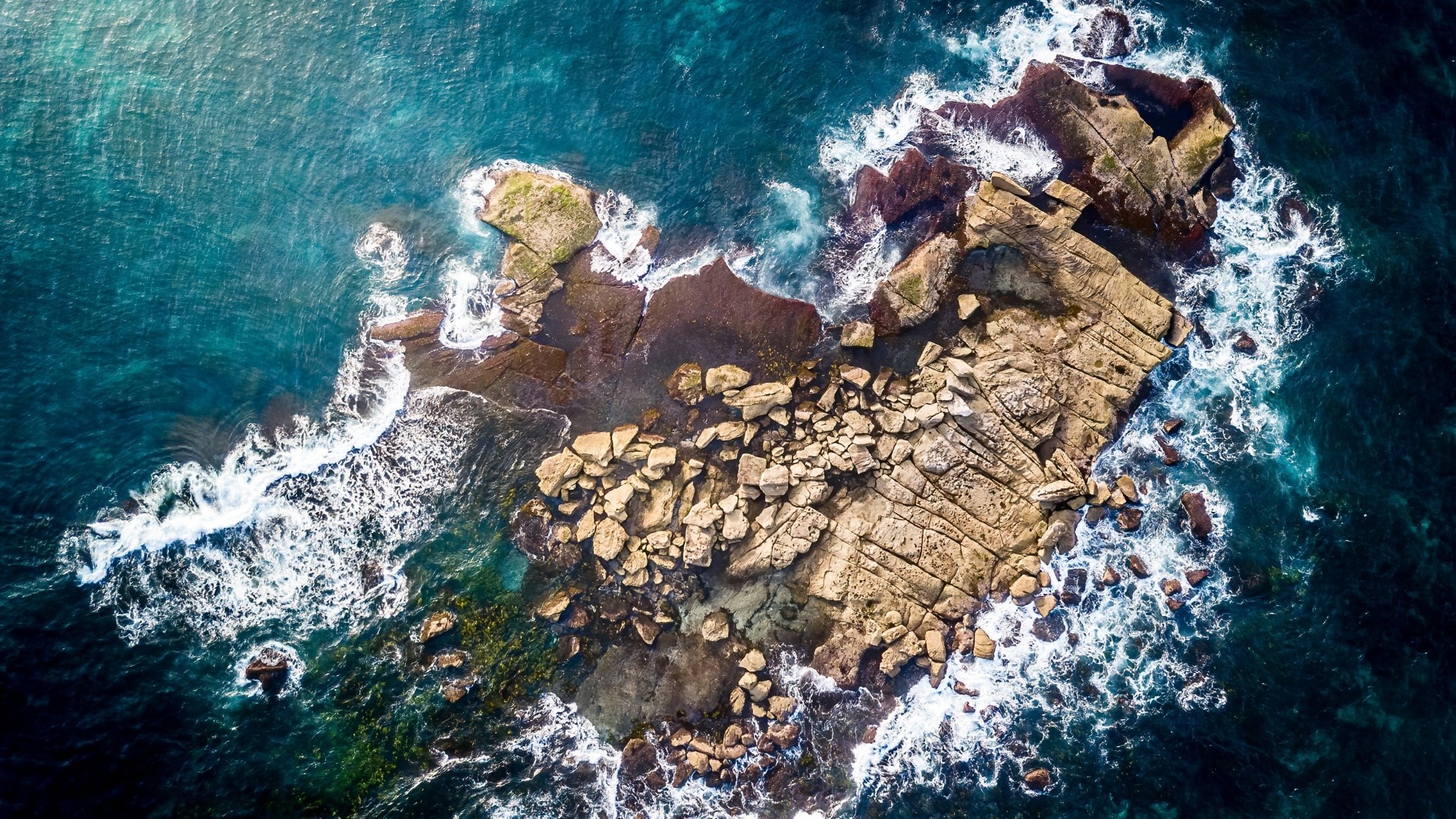 Oceanic Rockscape from Above - backiee