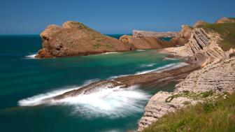 Rocky Serenity by the Sea wallpaper