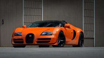 Orange Speed: Bugatti Veyron Elegance and Power wallpaper