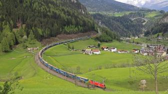 Train Journey Through Serene Valley wallpaper