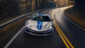 Chevrolet Corvette E-Ray Speeding on Scenic Road wallpaper