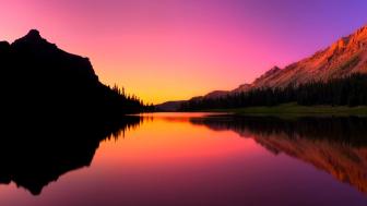 Sunset Serenity on a Tranquil Lake wallpaper