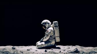 Astronaut in Solitude on Alien Terrain wallpaper