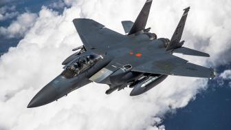 F-15 Eagle Soaring Above the Clouds wallpaper