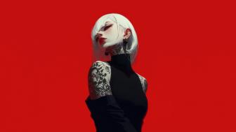 White-Haired Tattooed Girl in Bold Red Background wallpaper