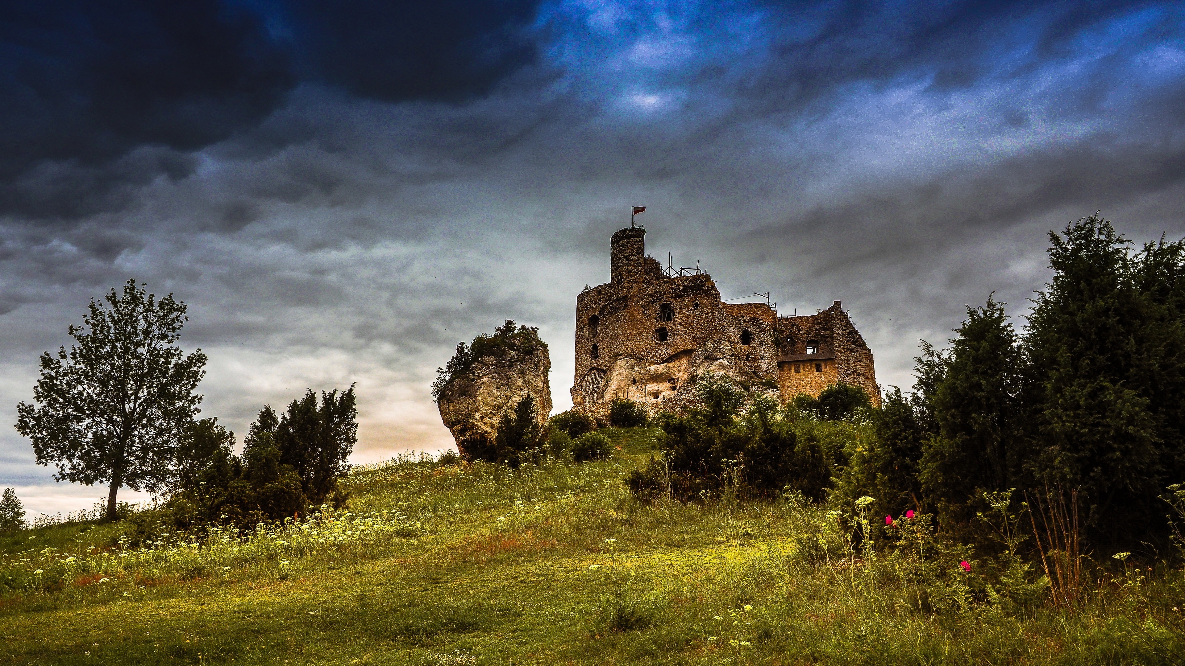 Castle Ruins Amidst Dramatic Skies in 4K - backiee